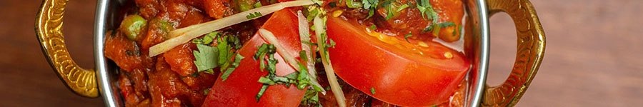 Close up of a curry in a balti dish