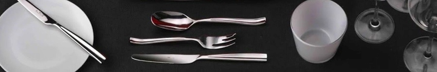 Image of cutlery with plates and cups